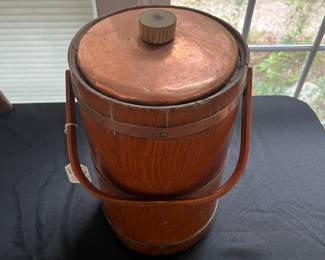 S36 - $45. Vintage Thermos. Wood Frame & Copper lid with glass insert. Measures 8" wide x 16" tall.