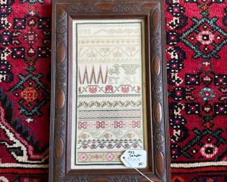 U25 - $35. 1993 Vintage Sampler. Measures 9" wide x 14.75" tall.