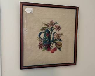 U23 - $25. Framed Needlepoint. Measures 16.25" wide x 17.25" tall.