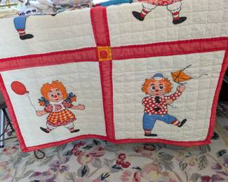 S10 - $35. Wall-hanging Raggedy Ann & Andy Quilt. Measures 40" x 55".