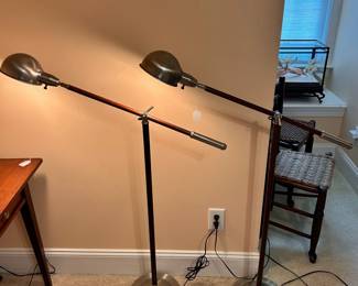 B19 - $55 Each. 2 Available. Wooden and Metal Folding Floor Lamp - adjustable. Measures 34" wide and adjusts heights. (39" tall from floor to the handle)