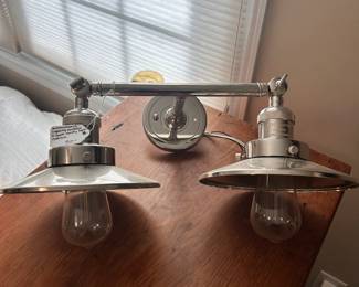 C11 - $50. Innovations Lighting Railroad 2-Light Vanity in Chrome. Measures 18" wide x 8" deep x 8" tall.
