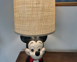 C6 - $40. Vintage Mickey Table Lamp. Painted Ceramic Base. Shade is in good condition. Measures 21" tall.