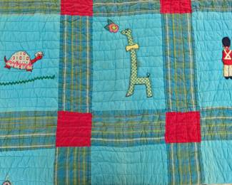S11 - $60. Hand-pieced and quilted baby blanket. Measures 73" x 42".