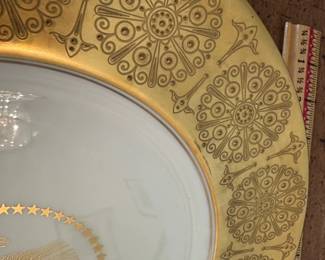 D60 - $1800. Dwight D. Eisenhower White House Plate 1955. Presidential Seal in the center with raised coin gold medallions. Back Stamp reads "Castleton Studios The White House November 1955. Measures 11.5" across. Only 120 produced!