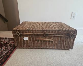 U9 - $40. Wicker Suitcase. Measures 27.5" wide x 16" deep x 10" tall.