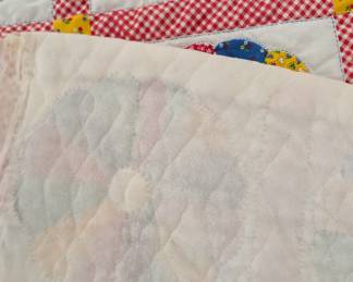 S3 - $30. Vintage Quilt. Hand Quilted Panels on Printed Fabric. Measures 53" x 70".