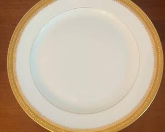 D9- $40. Limoges M. Redon set of 4 dinner plates. Measuring 10.25" round.