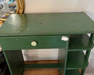 D49- $40. Vintage Small Wooden Desk painted green. Measures 29.75" wide x 16" deep x 30" tall.