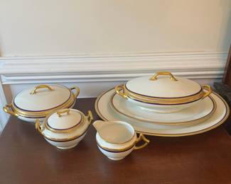 D32- $200. Limoges Dinner Set (9 pieces) Cobalt and Gold - includes 1 soup tureen, 1 cream+ sugar bowl, 1 serving platter (17.5" wide), 1 lidded serving dish, and 1 small platter (14" wide).