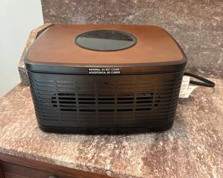 L3 - $40. Greentouch Infrared Electric Space Heater. Model 1224HI-12-243. Measures 13" wide x 11.25" deep x 6.5" tall