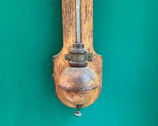 S41 - $450. Antique English Stick Barometer & Thermometer. Negretti & Zambia. Measures 4.5" wide x 36" tall. The top is either bone or Celluloid and reads "Chadburn Bros. Opticians Sheffield"