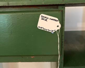 D49- $40. Vintage Small Wooden Desk painted green. Measures 29.75" wide x 16" deep x 30" tall.