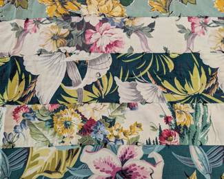 S9 - $40. Vintage Strip Quilt. Measures 65"x 80". Some staining on the back that may come out.