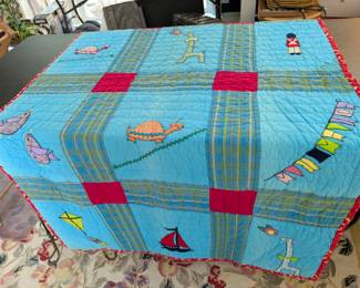 S11 - $60. Hand-pieced and quilted baby blanket. Measures 73" x 42".