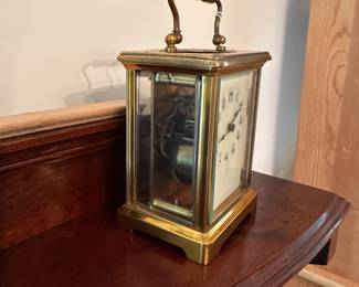 D59 - $175. "CH" Carriage Clock. Measures 3.25" wide x 2.5" deep x 5.5" tall with handle up. Top glass is moving around a bit - not falling out but needs repair.