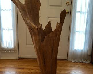 S48 - $300. Freestanding Driftwood Sculpture. Measures 34.5" x 15.5" x 46" tall. Owner used it for plants.