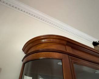 F20- $275. Pulaski Furniture Federal Style Cherry Illuminated Curio Cabinet. Measures 45" wide x 13" deep x 80.5" tall.