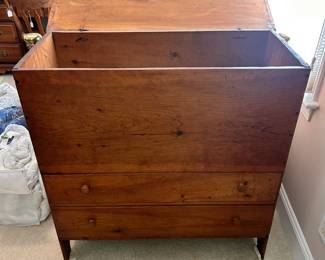 C9 - $350. Antique Mule Chest. Measures 39.5" wide x 17.5" deep x 40" tall. Lift top with open blanket chest. 2 drawers that both slide. (Tag from owner says 1800s Heart Pine.)