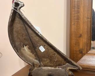 B4 - $20. Cast Iron Painted Doorstop. Measures 8.5" wide x 9" tall