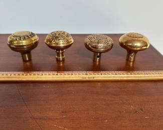 L65 - $60. Set of 4 brass knobs