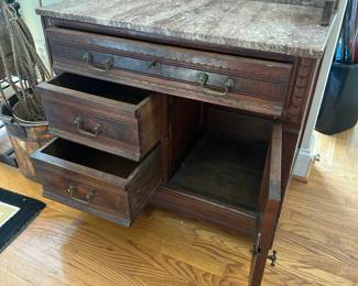 L1 - $300. Antique Edwardian Mahogany Marble Wash Stand. Top not attached and has a key. Measures 33.5" wide x 17.5" deep x 38" tall. Very good antique condition!