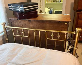 C18 - $100. Brass Bed Frame. Measures 49.5" wide x 81" long x Headboard 58" tall x Footboard 37" tall.