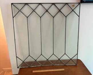 U46 - $50. Decorative Glass Panel. Measures 24" wide x 24" tall. One minor crack in the glass. Needs more support to use.