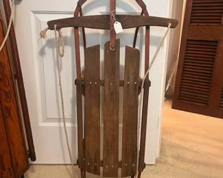 C23 - $75. Small Wooden Sled. Measures 22.25" wide x 6" tall x 38" long.