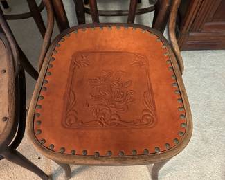 A26 - $60 Set of 4 chairs measuring 15.5" wide x 18.5" deep x 37" tall, floor to seat measures 18.5" tall. One has been redone with a leather seat - the other 3 are early project phases!