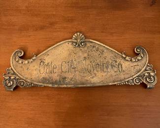D5- $70. Gate City Novelty Co. "Amount Purchased" Sign from a cash register. Measures 14" wide.