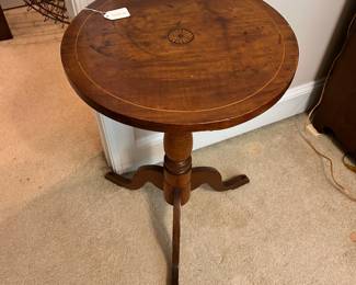 C26 - $50. Inlaid Wooden Table. Measures 16.75" across x 27" tall. Top has what looks like heat rings but it is sturdy!