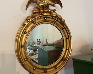 D28 - $250. Antique Federal Eagle Bullseye Mirror. Measures 18.5" wide x 25" tall.