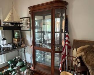 F20- $275. Pulaski Furniture Federal Style Cherry Illuminated Curio Cabinet. Measures 45" wide x 13" deep x 80.5" tall.