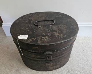 U12 - $50. Antique Victorian Metal Hat Box. Measures 15" wide x 12" deep x 11" tall.