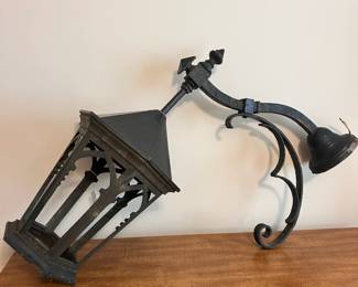 C14 - $100. Large - Wrought Iron Exterior Light Fixture. Measures 26" out from the wall x 27" tall.