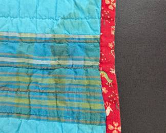 S11 - $60. Hand-pieced and quilted baby blanket. Measures 73" x 42".