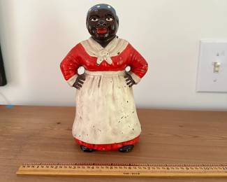 F10 - $85. Antique/Vintage Cast Iron Door Stop. Measures 8.75" tall.