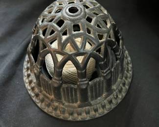 S24 - $35. Antique Cast Iron String Holder. Measures 6" wide x 5" tall.