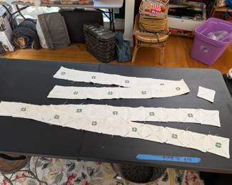S15 - $60. Crocheted Bed Spread for a Queen Bed. Measures 116" wide x 95"Long (has staining and includes extra panels)