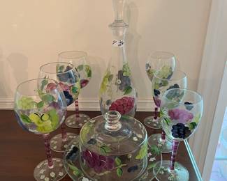 D55- $20. 10 pc. Painted Wine & Cheese Set. Measures 5.25" - 15.25".