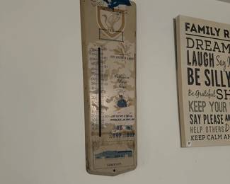U69 - $30. Metal Thermometer Frame Advertising Piece. Measures 8" wide x 24" tall. (No thermometer included - just the metal frame)