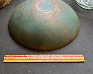 L37 - $125. Round Wooden Dough Bowl. Slightly out of round. Measures 13.5" wide x 12" deep x 4" tall. Blue green exterior.