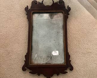 A20 - $30. Antique Mirror. Measures 14" wide x 24" tall. Mirror is OLD. Frame is not in great condition.