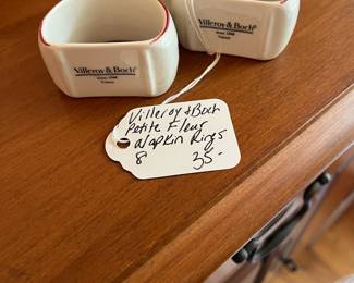 D41- $35. Set of 8 Villeroy and Boch Petite Fleur Napkin Rings. Measure 2" wide.