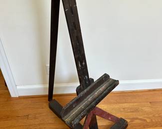 L60 - $175. Antique Wooden Painters Floor Easel. Measures 82" tall when flat. Very adjustable!Partial Tag on the side reads Boston, MA.