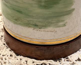 F53- $575. Frank Vosmanski Hand Painted Golfer Lamp. Base is 5.25 d x 20.5" tall.