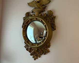 A16 - $175 Turner Bullseye Eagle Mirror. Measures 18.5" wide x 30.5" tall.