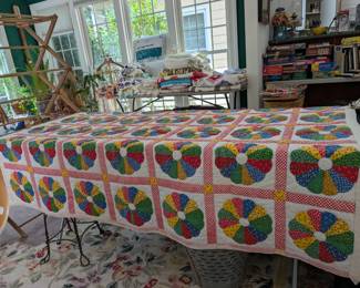 S3 - $30. Vintage Quilt. Hand Quilted Panels on Printed Fabric. Measures 53" x 70".