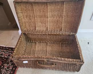 U9 - $40. Wicker Suitcase. Measures 27.5" wide x 16" deep x 10" tall.